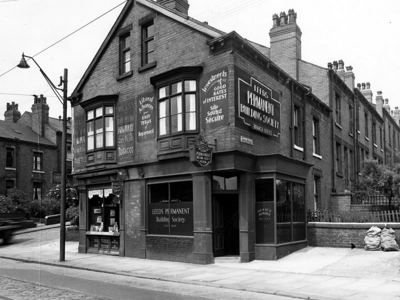 Kirkstall Road at the junction with Sowood Street, premises of Leeds Permanent Building Society. At junction with Bankfield Terrace is Nellie Sarah Moorhouse's confectioners. Pictured in August 1950.