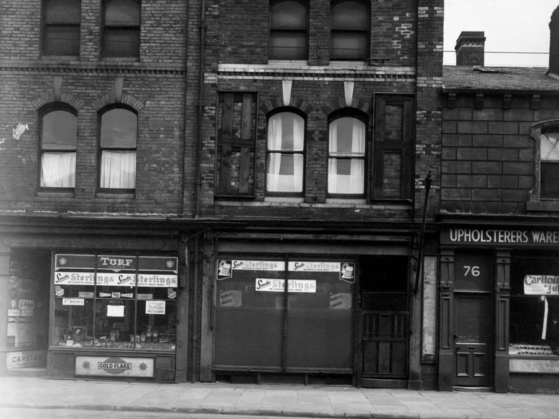  Joseph Wilson confectioners, Barney Brown Hairdressers and an upholsterers warehouse. Pictured in June 1951.