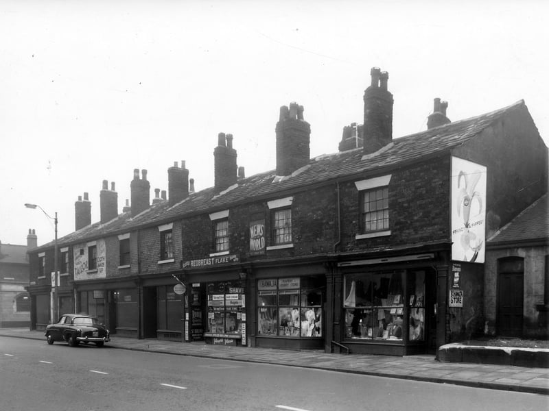 On the left is Lloyd Street, just visible is part of the Morning Star public house. Moving right, number 172 Kirkstall Road is a vacant shop, next 170 is also, empty. C. Miller, tailor is operating from number 168, then 166 also empty. At 164 is a barbers shop and tobacconists, then 162/160 is the Khawaja Drapery and Hosiery Stores. To the right, not in view, is Ventnor Street Methodist Church. Pictured in October 1959.