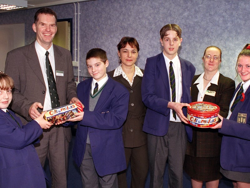 Presentation of Attendance Awards at Highfield High School, for the first half term of Mersey House. From left, Laura Owen (runner-up),  Paul Guy (manager, Highfield Road branch of Booths Supermarket), Michael Trow (runner-up), Eva Perkin (Blackpool Council Education Social Worker for South Shore), Robert Redfern (winner), Adele Dunn (checkout manager, ASDA-Cherry Tree Road) and Natasha Nelis (winner).
