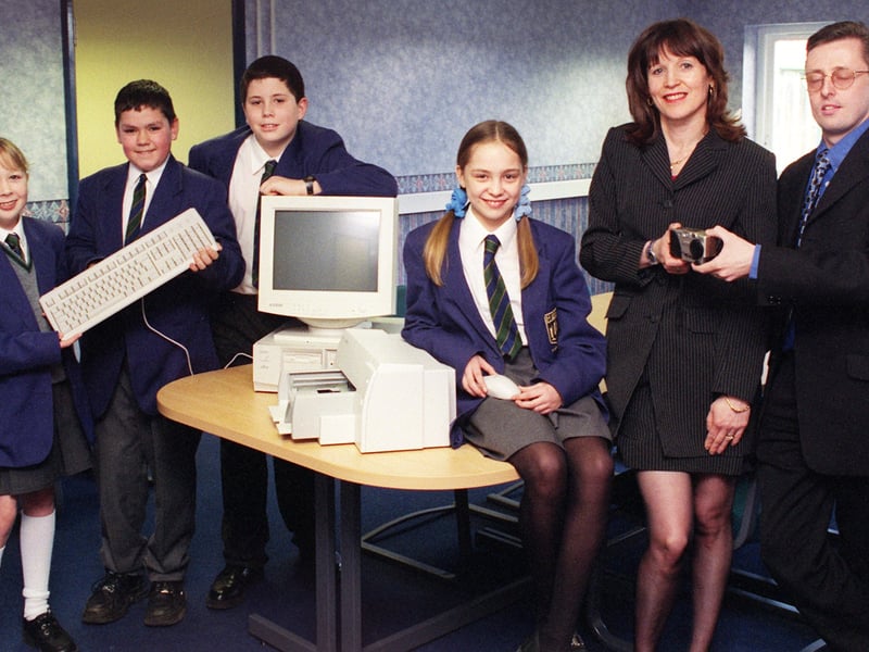 Highfield High School, Blackpool receive their prize for winning the senior section of Technology for schools competition. L-R Jennifer Milburn, Thomas Tribick, Sam Workman, Kelly Ann Haigh, Highfield ICT co-ordinator Janet Webster and Western Business Systems sales manager Peter Cross