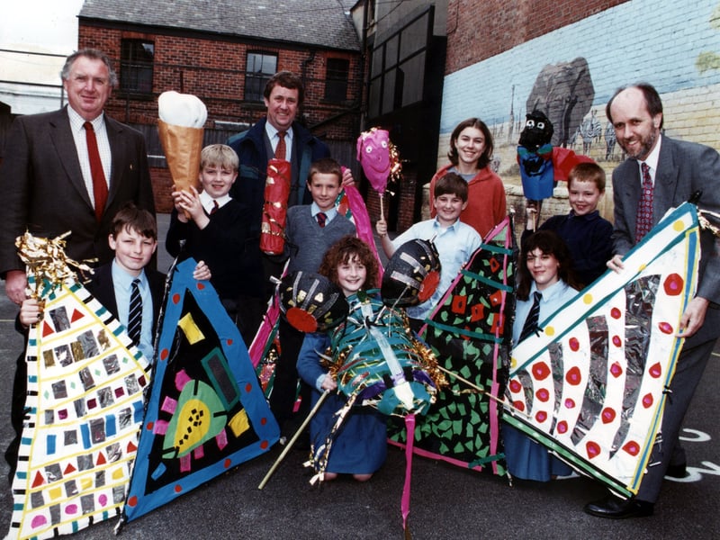 Showing off some of the puppets made in the educational workshops are Year 5 pupils from St John's Primary School and Year 7 pupils from Collegiate High School. With them are (back row, left to right) John Turkington, Head Teacher St John's, Nigel Hanson, Blackpool Town Centre Manager, Alison McGowan, Puppeteer and Alan Roberts, BT External Relations Manager.
