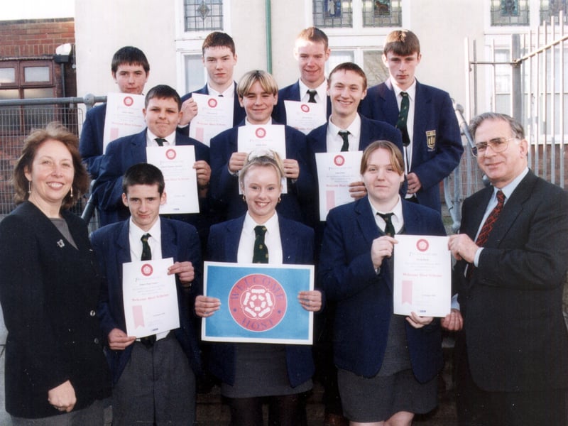 Mrs Diane Austin, GNVQ Co-ordinator and Anthony Goldstone OBE, Chairman of the North West Tourist Board presenting the Welcome Host Certificates to the pupils of Highfield High School