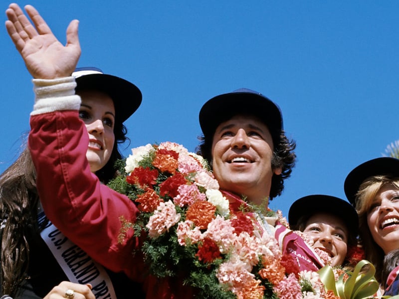 Mario Andretti won the F1 Drivers' Championship in 1978 and is the only driver to have won that title along with the Indianapolis 500 and Daytona 500. He is also one of only three drivers to have won races in Formula One, IndyCar, the World Sportscar Championship, and NASCAR. He's worth an estimated $130 million.