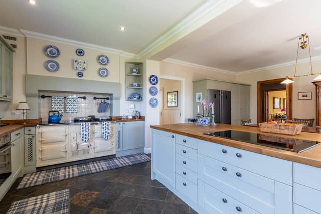 This country house fits in seamlessly with the appearance of its long-standing architectural neighbours, but actually dates from 1998.