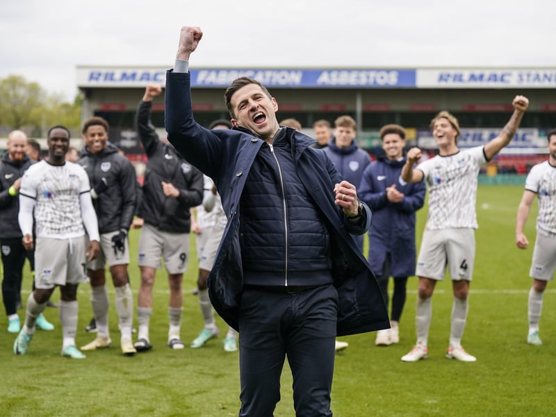 He held off on doing until the final day - but John Mousinho gave Pompey fans what they wanted with a pumped-fisted salute at Lincoln.