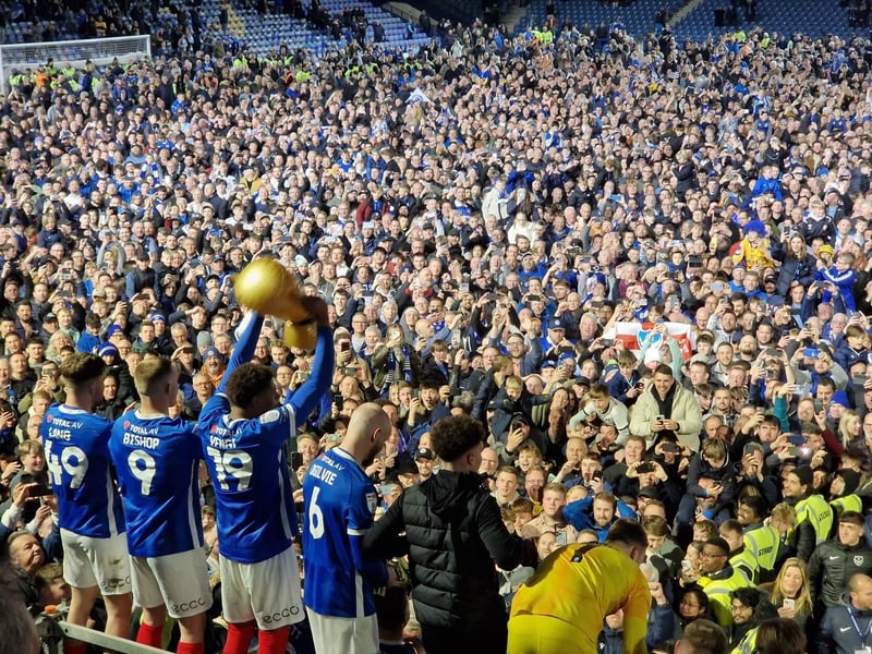 The fans are on the pitch against Barnsley