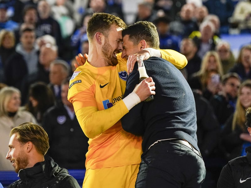 An embrace for John Mousinho from Will Norris against Barnsley