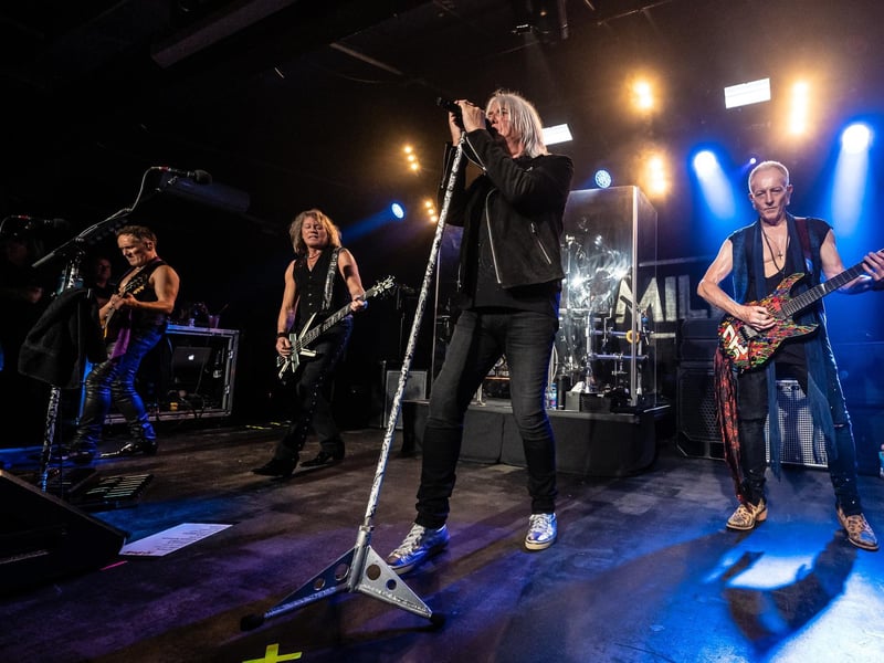 Joe Elliott came up with the name for the band two years before they actually formed. He explained how the moniker first came to him while he was studying at King Edward VII School. Fed up with drawing fruit and flowers in art class, he asked to design posters for rock shows. He started making posters for real bands, like the Beatles and Rolling Stones, before inventing his own band, Deaf Leopard. He even reviewed the made-up band for a creative writing assignment at school. The spelling was changed later, after the band formed.