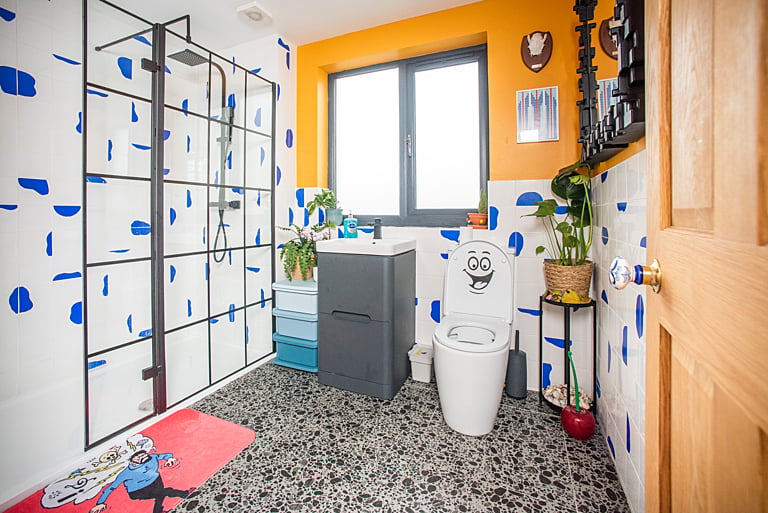 Even the smallest room has a visual impact, with mismatched patterns and cartoon motifs.