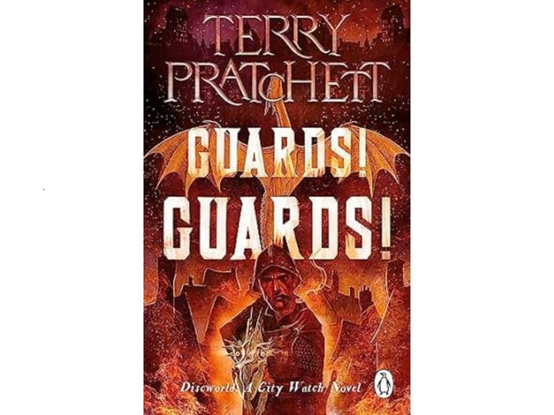 The first of the City Watch series, and the eighth Discworld novel, is up next. Guards! Guards! was published back in 1989 and scores an average rating of 4.34 from 210,839 reviews. "The city of Ankh-Morpork is in turmoil, its citizens revolting. Again. A shadowy secret brotherhood has summoned a dragon to spread terror throughout the city, intent on overthrowing the Patrician and ruling in his place. Too bad the dragon has ideas of its own. It's up to Captain Sam Vimes and the ramshackle Night Watch to stop it. Only problem is, the Watch are more used to dealing with mobs than dragons. And if they can't bring down this fire-breathing tyrant and reinstate their own, slightly less dangerous one, Ankh-Morpork might be lost. For ever..."