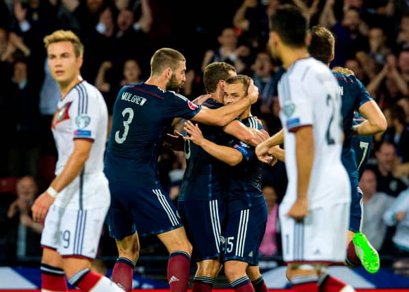 Scotland celebrate their first goal in the 3-2 defeat to Germany in 2015. Cr. SNS Group.