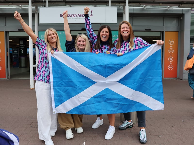 With matching shirts and a saltire, these four Scotland fans are definitely in Euros mode.