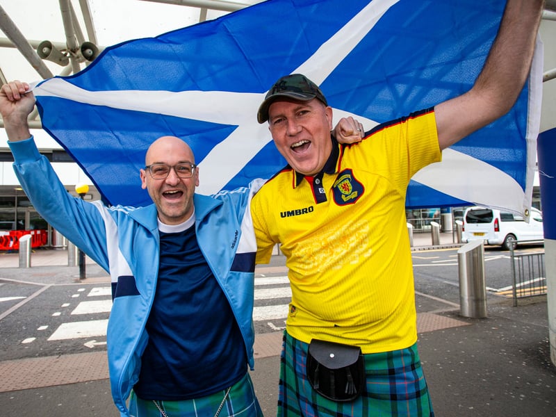Complete with a flag and retro 1998 away kit, these two lads are heading to the Euros!