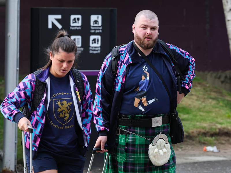 These Scotland fans head to Germany, one complete with his Diego Maradona shirt.