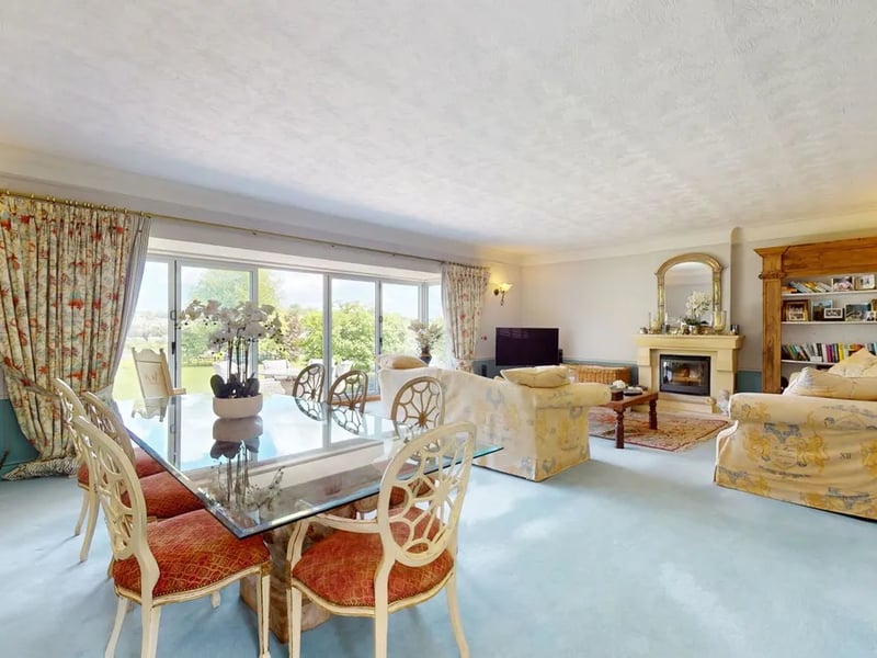 The impressive lounge/dining room has a delightful and far-reaching view over the rear gardens and countryside.