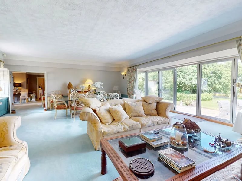 A sitting room, which could also be used as a formal dining room, providing flexibility.