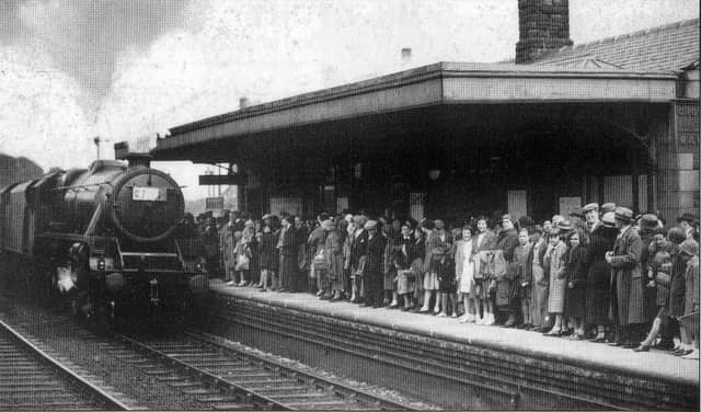 A crowd of people on the platform of Morley Top Station waiting for the train to Cleethorpes in 1937.
