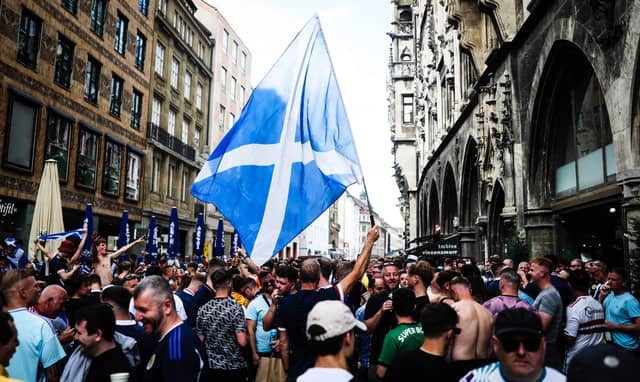 Scotland fans have taken over Munich, with some pictured here at the Marienplatz.