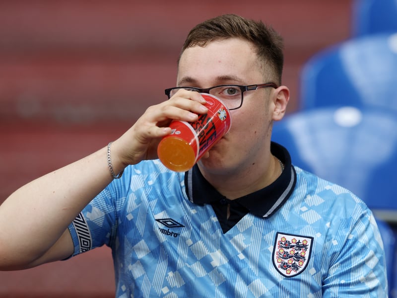 Yes, he's having a drink - but focus on that iconic kit from 1990.
