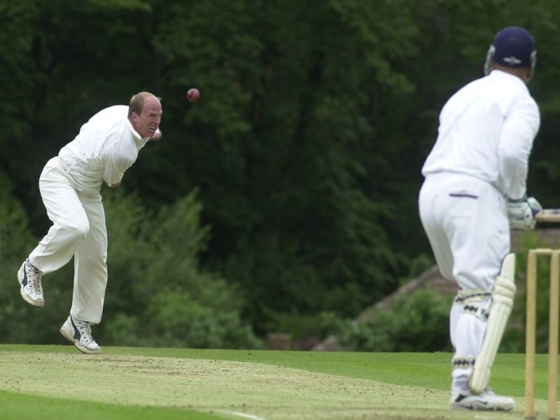 Bowler Steve Ellis sends down a delivery during Farsley CC's clash against Yorkshire Bank in June 2000.