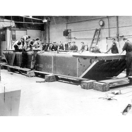 A raft float built during the second world war at Shieldhall Furniture factory. The vast factory complex in Govan was run by the Scottish Co-operative Wholesale Society produced all sorts of odds and ends.