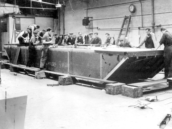 A raft float built during the second world war at Shieldhall Furniture factory. The vast factory complex in Govan was run by the Scottish Co-operative Wholesale Society produced all sorts of odds and ends.