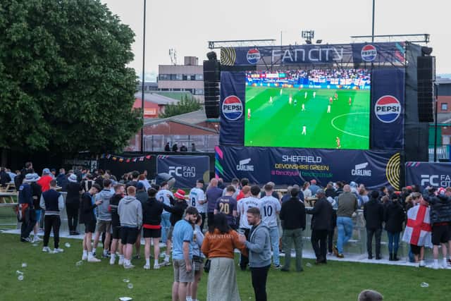 Fans gather to watch England vs Serbia at Sheffield's 'Fan City' on Devonshire Green for the nation's opening match in the Euros 2024, July 16.