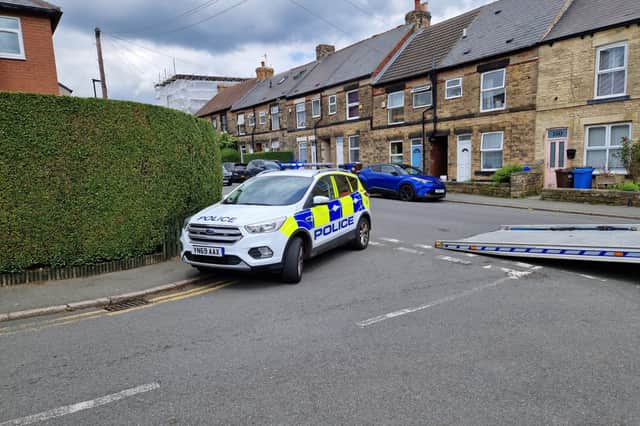Man arrested by police 'after chase on foot' along street