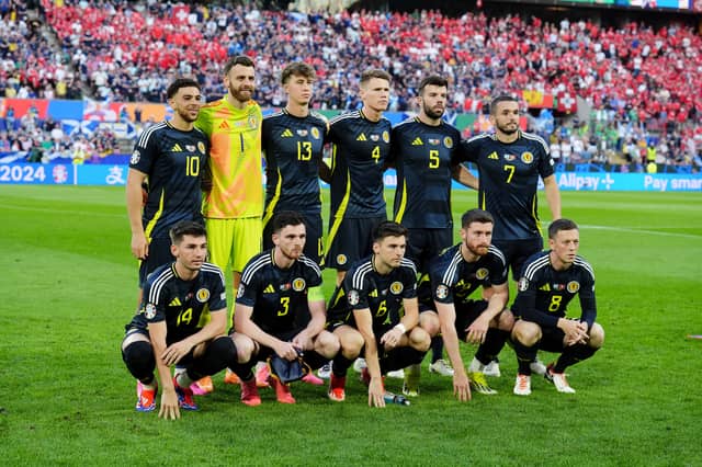 Scotland players line up for a team photo ahead of facing Switzerland.