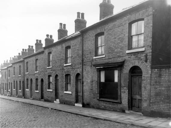 A long view of Lincoln Field Row in October 1958 showing far right number 35 (numbers descend in an odds sequence left towards Cherry Row). Number 35 has been a shop, although it looks as though it is no longer used as one. The 1932 Kelly's Directory of Leeds lists no 35 as being occupied by Harry Bowes, grocer.