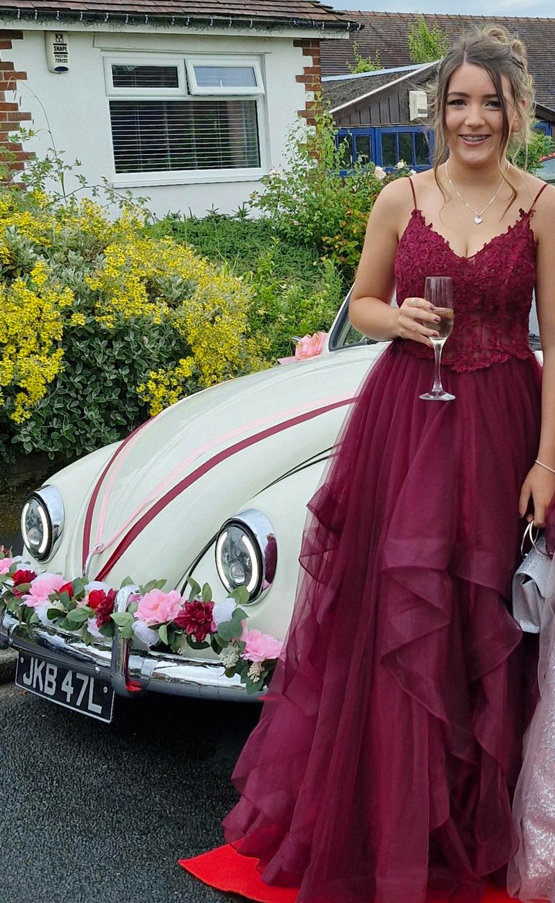 Another opportunity to pose in front of their glam car