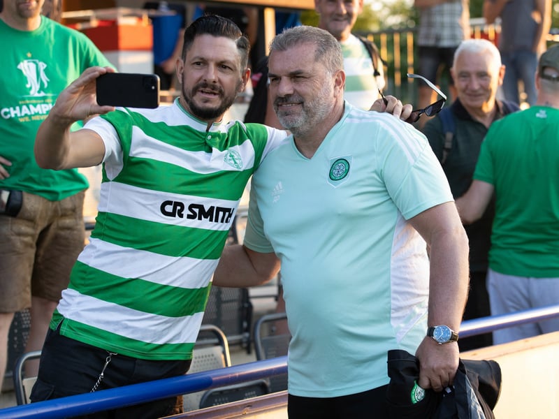 Celtic manager Ange Postecoglou takes pictures with fans during a pre-season friendly between SC Wiener Viktoria and the Hoops.