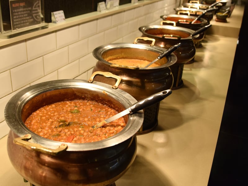 You can enjoy a full Indian banquet of curries including chicken tikka masala, channa (chickpea) curry and more