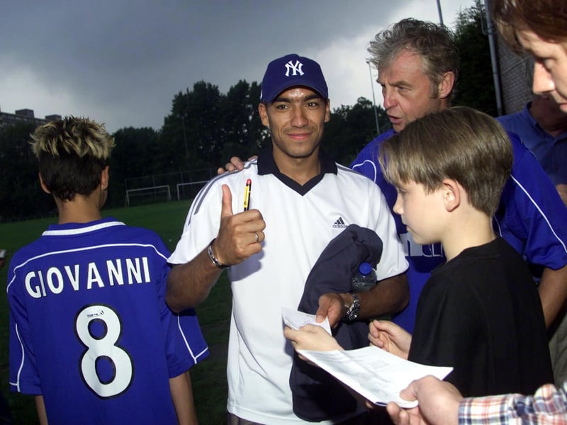 Ex-Gers star Giovanni Van Bronckhorst chats with fans after watching the match against VV Capelle in 2001.
