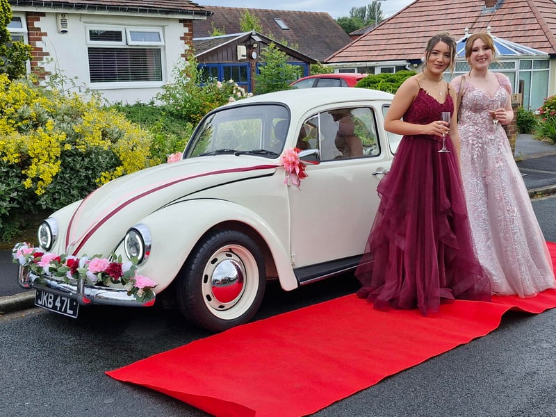 Two girls arrive in style