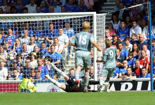 Rangers fans watch on as Fernando Torres scores for Liverpool at Ibrox in pre-season 2008.