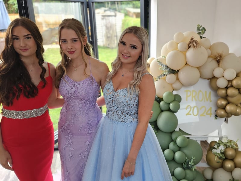 A trio of leavers in their glam dresses