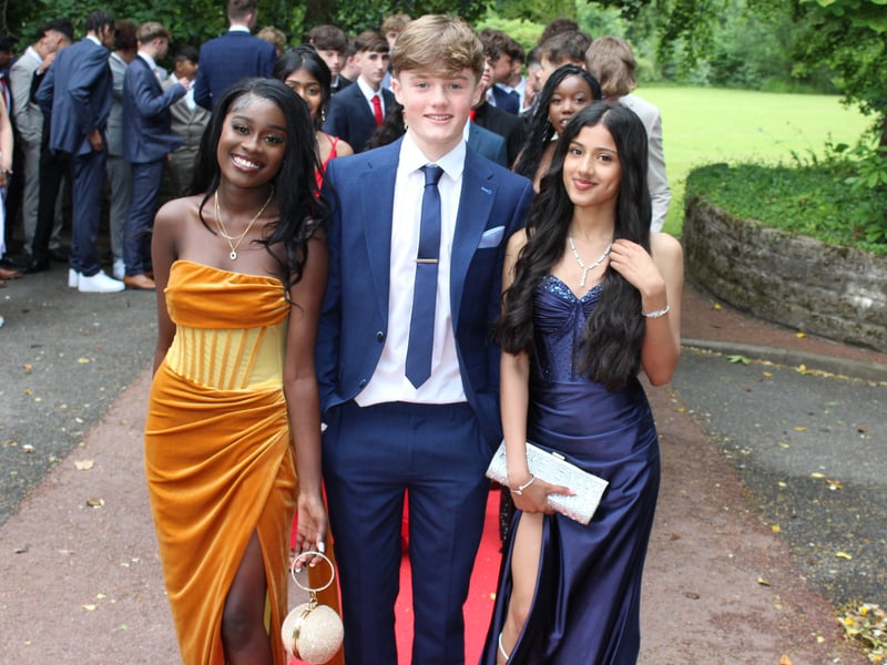 A trio of leavers pose on the red carpet