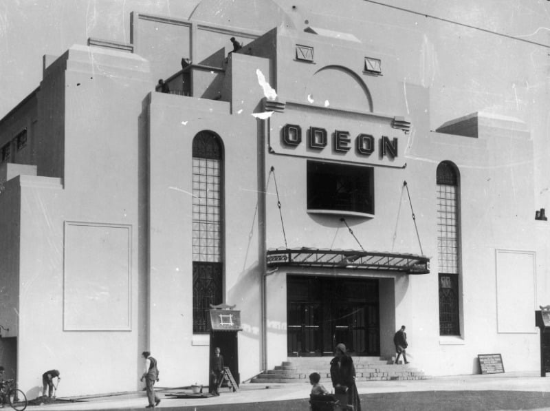 The first-ever Odeon cinema was designed to resemble a Moorish palace rather than the streamlined modernism that the circuit was known for. Oscar Deutsch, the cinema's founder, also had an apartment there. After his death in 1941, staff paid respects as his funeral cortege passed by the cinema. The cinema, closed in 1969, is now a banqueting suite.