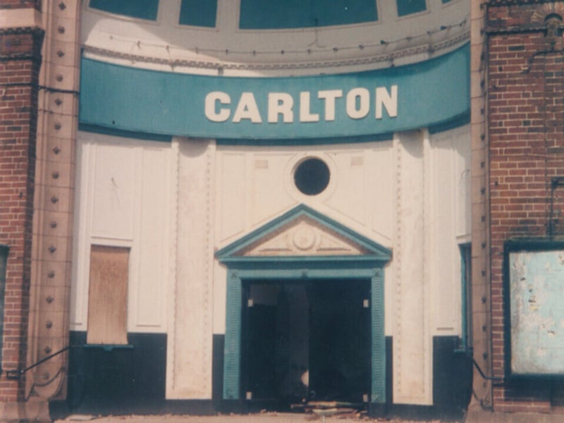 The Carlton, a distinctive cinema with a half-domed entrance, was the first in Birmingham with a lift, to take patrons up to the balcony. It was hit during a 1940 bombing, killing nineteen people. It was rebuilt in 1943 and ran until 1980, with a focus on South Asian programming in the 1970s. It staged performances from the early 1980s until its demolition in 1985. A memorial garden now commemorates those killed.