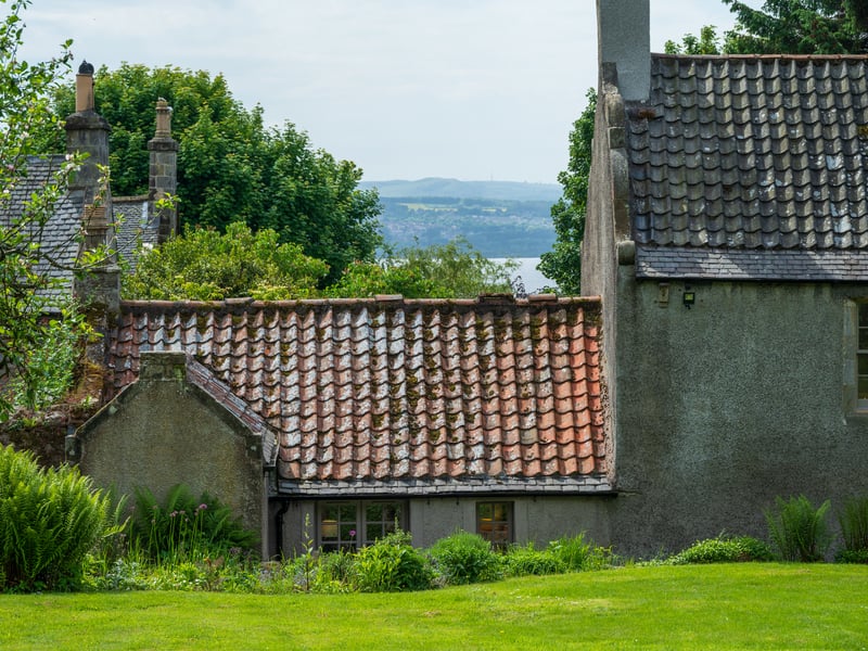 The house is set in secluded grounds of one and a half acres, containing a summer pavilion with wood-burning stove, with extensive views of the Forth.