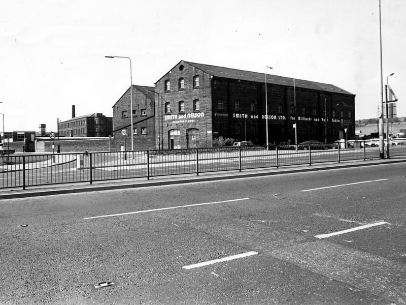 Wellington Road showing the junction with Armley Road on the left. The building in the centre is Smith and Nelson Ltd., billiard table manufacturers. Pictured in July 1980.