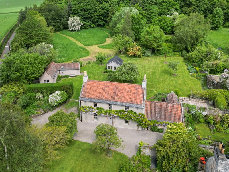 Parleyhill is a charming early-18th-Century house, packed with period features, including curvilinear gables and even the original door knocker. Inside, there are cosy low ceilings, wood panelling and flagstones. 