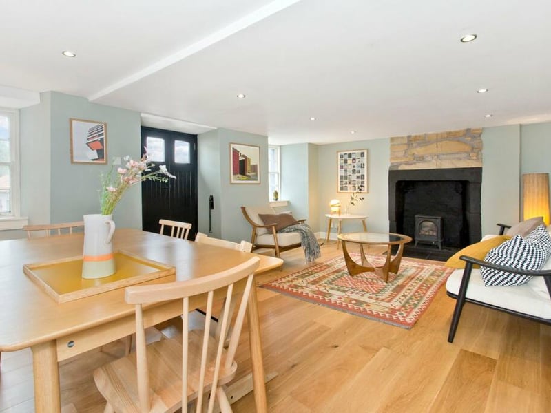 Inside it offers cosy proportions and original fireplaces to give it bags of character, but it is also a comfortable modern home. The accommodation is set over three storeys. There is a bright living and dining room and a south-facing breakfasting kitchen complete with garden access.