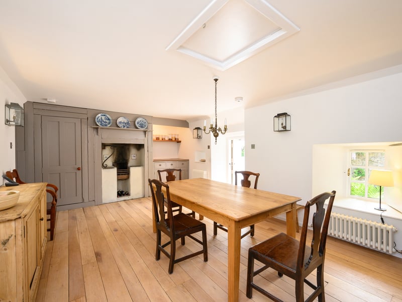 It has a sitting room, study, dining room and kitchen. There are two double bedrooms, which share an ensuite, and an annex with a double bedroom, wet room, home office and utility room.