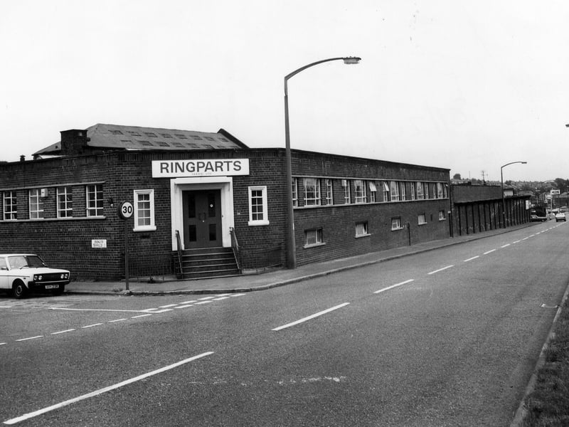 Whitehall Road showing Ringparts (Leeds) Ltd., wholesale vehicle parts, at the Whitehall Road Industrial Estate. The junction with Bangor Terrace is on the left. Pictured in August 1981.