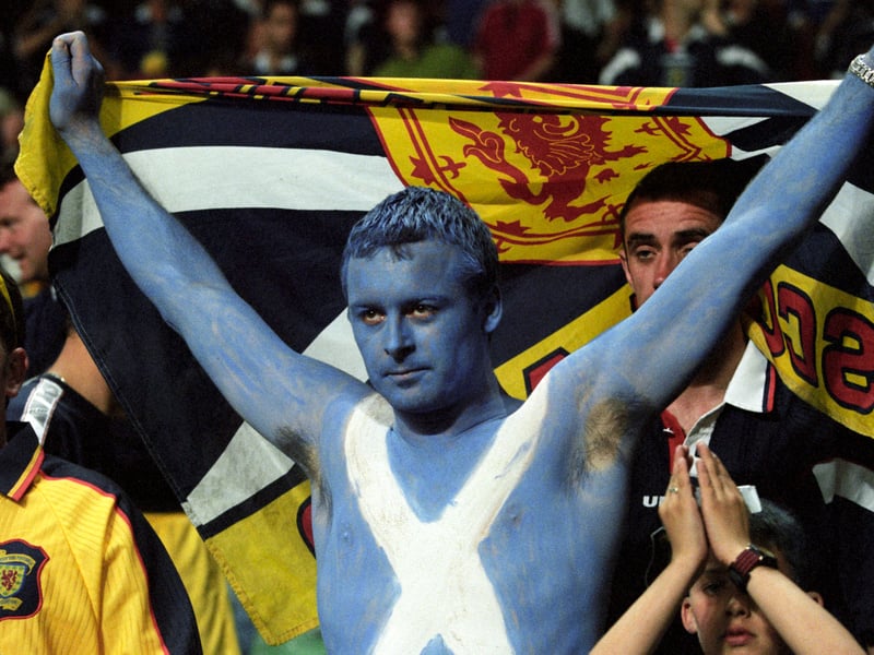 A Scotland fan does his best impression of the Blue Group, with a Scottish twist.