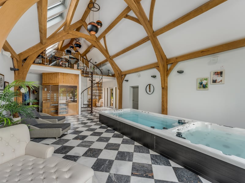 One of Heathfields's most unique aspects is its pool room complete with five-person jacuzzi and sauna. Above it is the games/cinema room and bar.