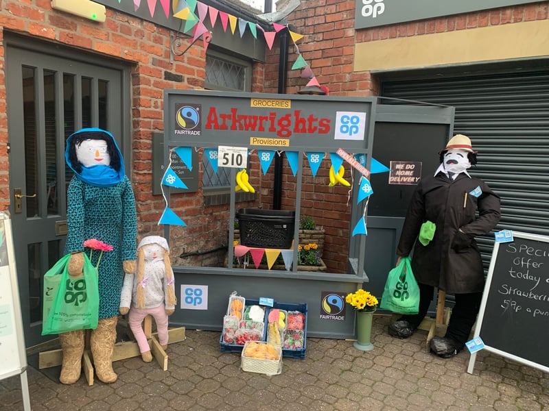 Scarecrows having a shop